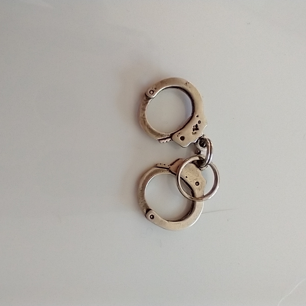Sterling hand cuff charm